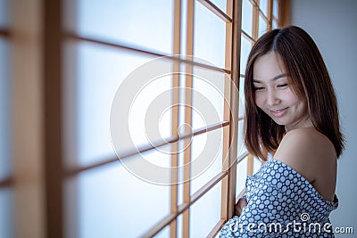 Sexy girl wearing Yukata on lower body and nude on upper Stock Photo