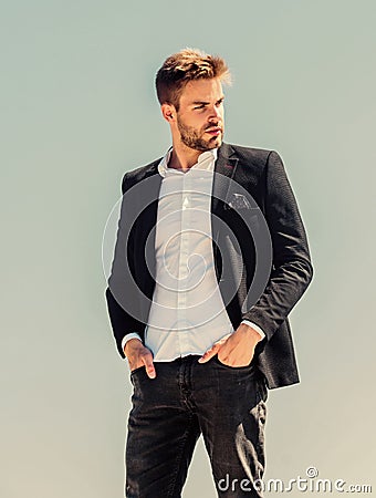 Sexy macho man. male grooming. confident businessman. Handsome man fashion model. success concept. Sky background Stock Photo