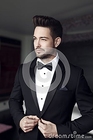 man celebrity in tuxedo indoor Stock Photo