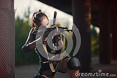 military armed girl with the weapon, sniper Stock Photo