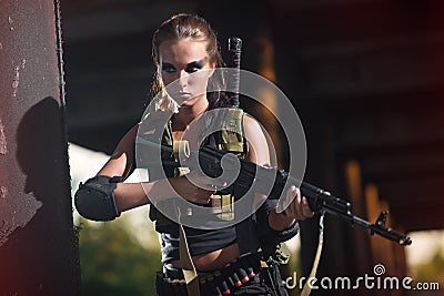 military armed girl with the weapon, sniper Stock Photo