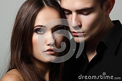 passion couple, beautiful young man and woman closeup Stock Photo