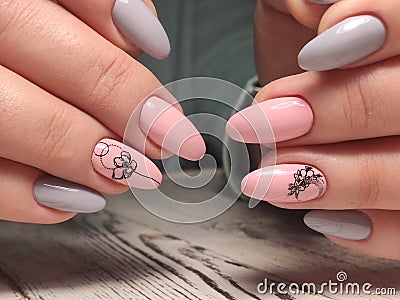 sexy pink manicure on long beautiful nails Stock Photo