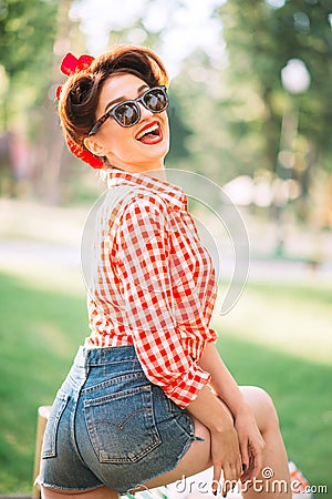 pinup girl outdoors, retro american fashion Stock Photo