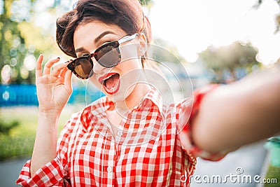 pinup girl outdoors, retro american fashion Stock Photo