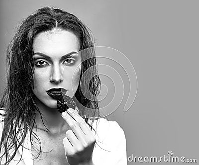 pretty woman with red lips and strawberry Stock Photo