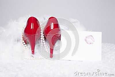 Red Pumps with Lipstick Kiss Stock Photo