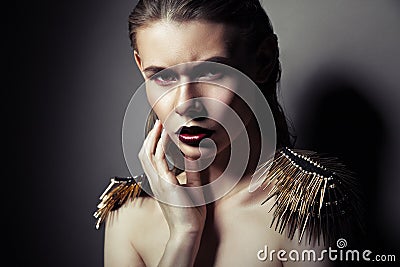 strict woman with red lips and epaulettes Stock Photo