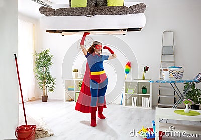 strong super hero woman holding bad in the air Stock Photo