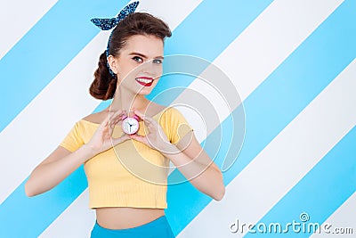 Young retro pinup woman on colorful background Stock Photo