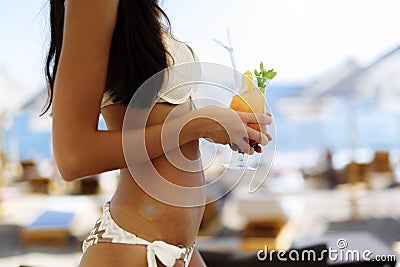 woman holding cocktail Stock Photo