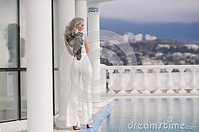 woman with long hair in amazing clothes Stock Photo