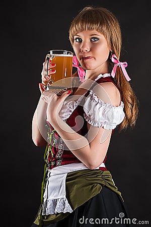 woman Oktoberfest licking lips Stock Photo