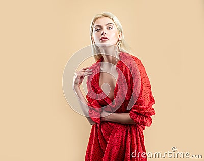 Sexy woman in red polkadot dress. Trandy fashion. Stock Photo