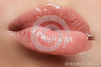 woman's lips. Beauty lips make-up. Beautiful make-up. Sensual open mouth. Lipstick and lip gloss. Natural full lips Stock Photo