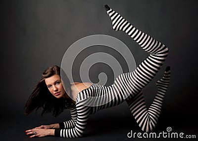 Woman in Striped Bodysuit Stock Photo