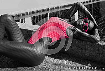 woman in swimsuit at swimming pool - black and white photo Stock Photo