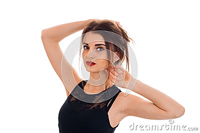 young brunette woman with red lips posing isolated on white background Stock Photo