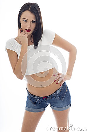 Young Caucasian Woman Wearing a White Vest Top and Blue Den Stock Photo