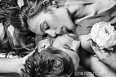 Sexy young couple in love. Portrait of intimate passionate sensual people. Kiss each other, enjoying tenderness. Stock Photo