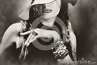 young pretty woman model lips makeup, vintage, retro hat and jewelry Stock Photo