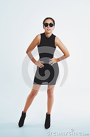 young woman in a black ensemble Stock Photo