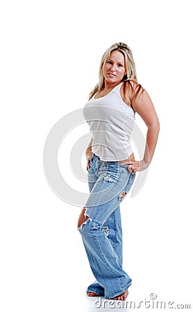 young woman with ripped jeans Stock Photo