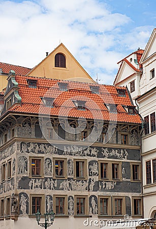 Sgraffito plaster art work on the `Dum U Minute` House of Minutes Building in Old Town, Prague, Czech Republic. Editorial Stock Photo