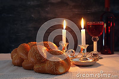 shabbat image. challah bread, shabbat wine and candles Stock Photo