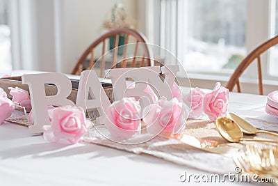 Shabby Chic pink baby shower decorations on table Stock Photo