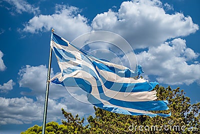 Shabby greek flag waving in the wind Stock Photo