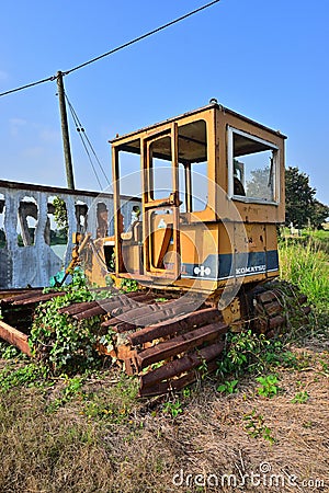 Excavator shabby heavy duty machine Editorial Stock Photo