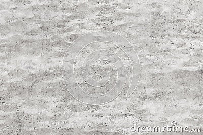 Shabby wall of an old house with uneven crumbling plaster. Stock Photo