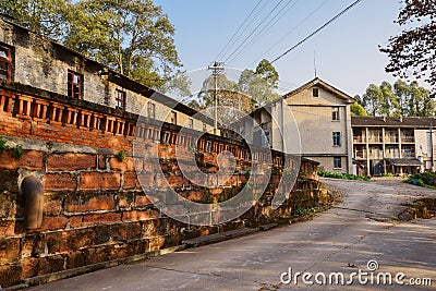 Shaded slope in deserted 630 factory built in 1970s Stock Photo