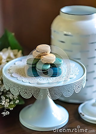 Shades of Blue Macaroons on Dessert Tray Stock Photo