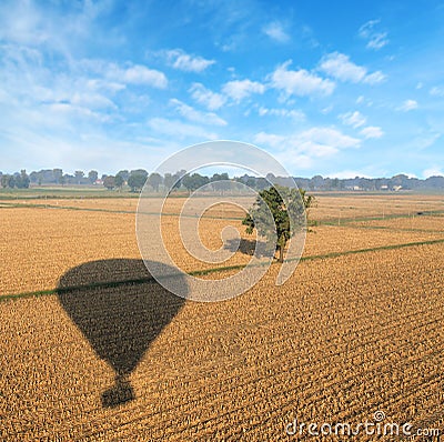 shadow of a balloon in the field Stock Photo