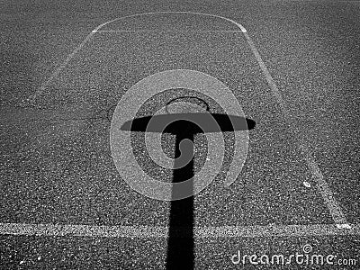 Shadow of Basketball Hoop on Urban Ghetto Court Texture Stock Photo