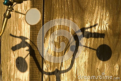 Shadow of Bicycle Handlebars Stock Photo