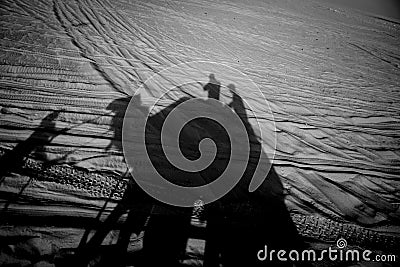 Shadow camel ride Stock Photo