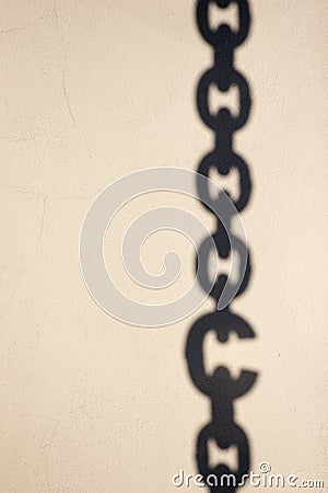 Shadow of chain with broken link Stock Photo