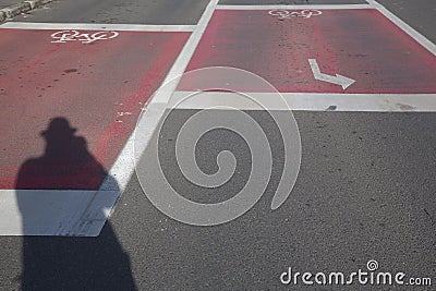 Shadow of the man on the street Stock Photo