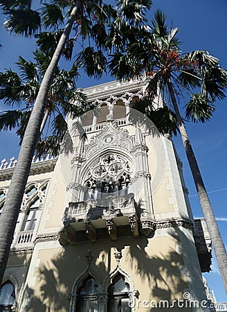 Shadow of palm tree on the building of Government House of Thailand , Bangkok Stock Photo