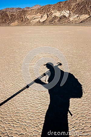 Photographer shadow in the desert Stock Photo