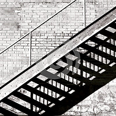Shadow of a stairs on a brick wall Stock Photo