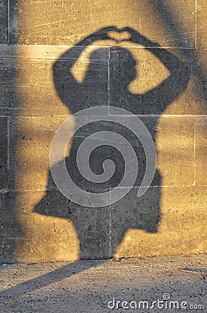 shadow of a woman with heart Stock Photo