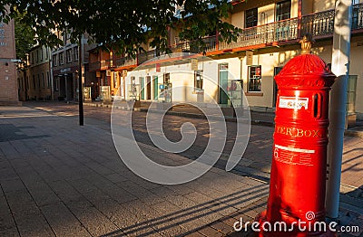 shady heritage Nurses Walk street in Rocks district with bright red traditional iron letter-box Editorial Stock Photo