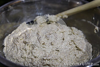 Shaggy rye and wheat sourdough after mixing the dough for artisanal rustic wholegrain sourdough bread, photo series Stock Photo