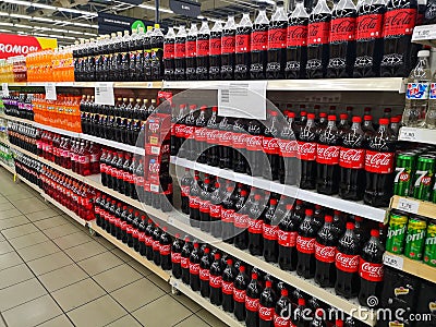 Shah Alam, Malaysia - 25 June 2022 : Assorted Carbonated Soft Drinks Bottles display for sell on the supermarket raw Editorial Stock Photo
