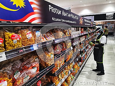 Shah Alam, Malaysia - 20 November 2020 : Line or row Malaysian Products display for sell on the supermarket aisle Editorial Stock Photo