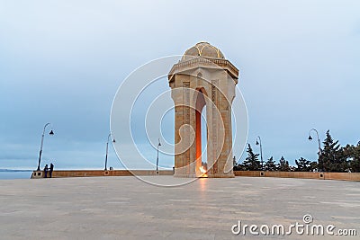 Shahidlar Monument or Eternal flame Monument on Martyrs` Lane in the evening. Baku. Azerbaijan Editorial Stock Photo